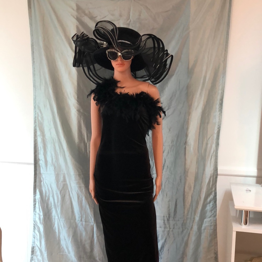 Long chocolate velvet evening gown with ostrich feathers
